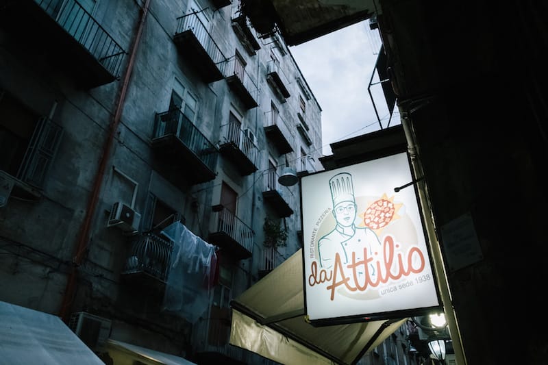 The entrance of the Pizzeria Da Attilio is seen here from Via Pignasecca in Naples, Italy. Photos by Gianni Cipriano