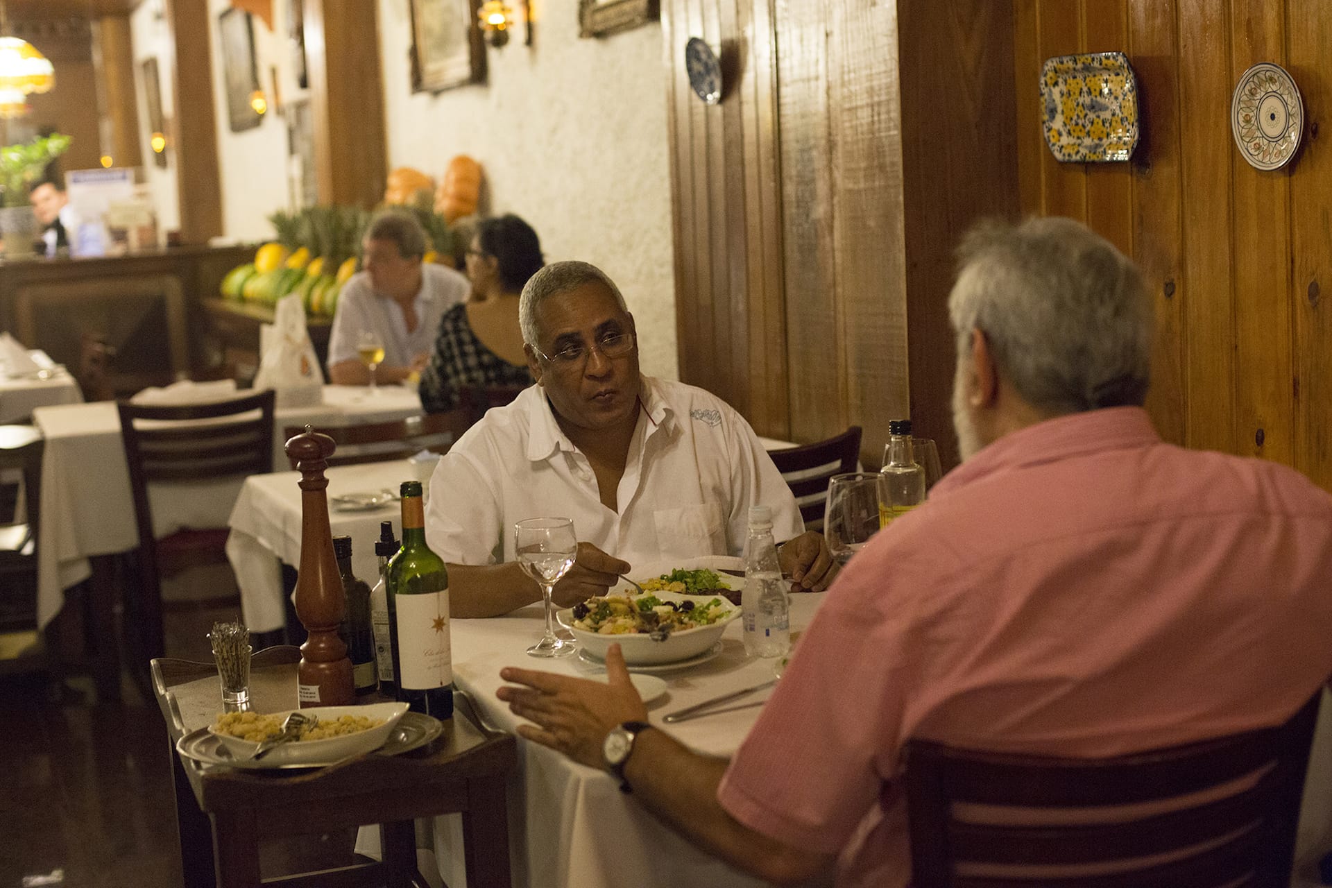 two men at table in restaurant