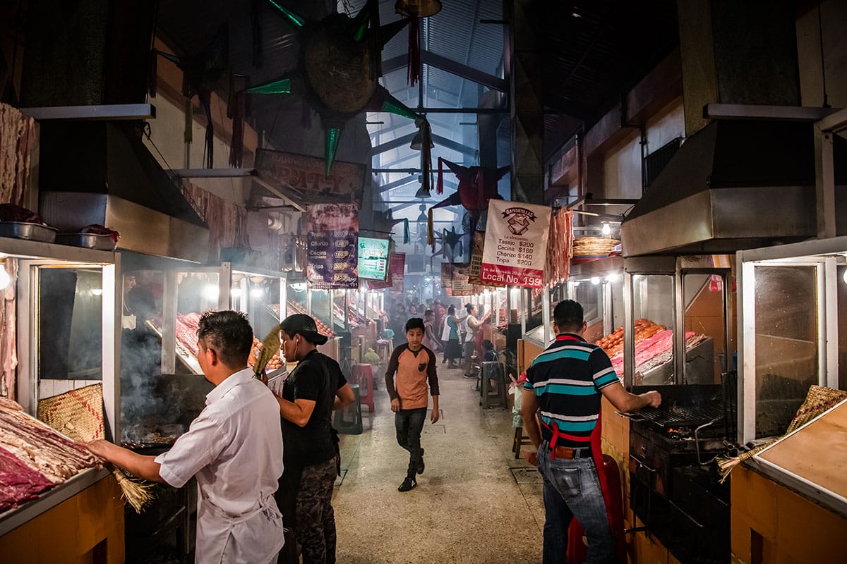 Brave the market corridor lined with smoking grills for selection of freshly grilled meats