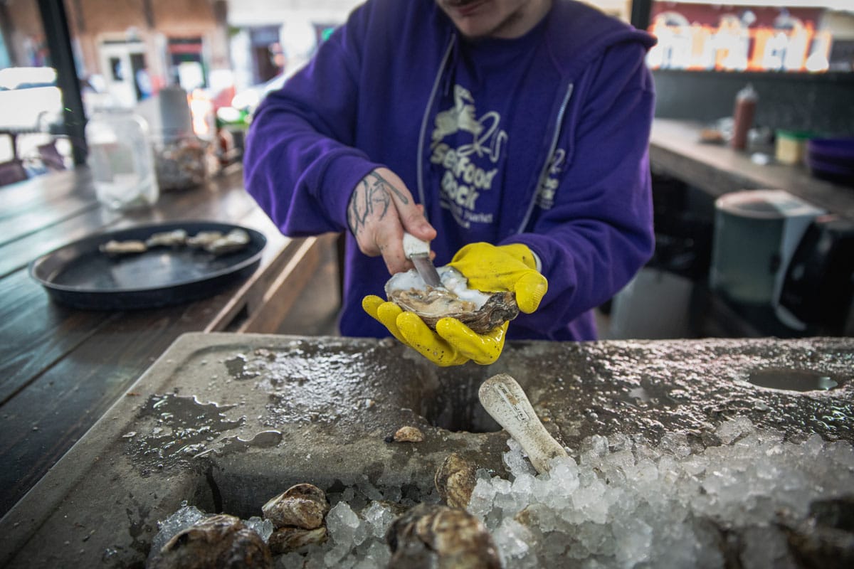 Taste the brine of the sea in a freshly shucked gulf oyster