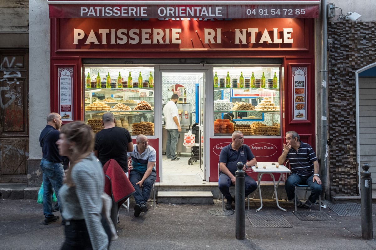See some of Europe's greatest street life in the small historic districts near the port