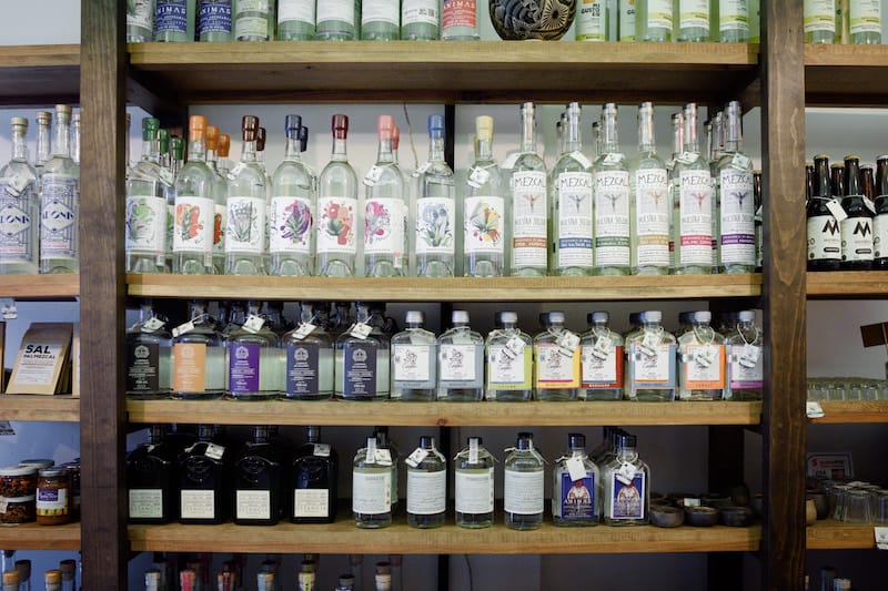 Omar makes clear to those who come in, every bottle of mezcal tastes different, even from the same brand, the same agave variety and same year. Photos by PJ Rountree.