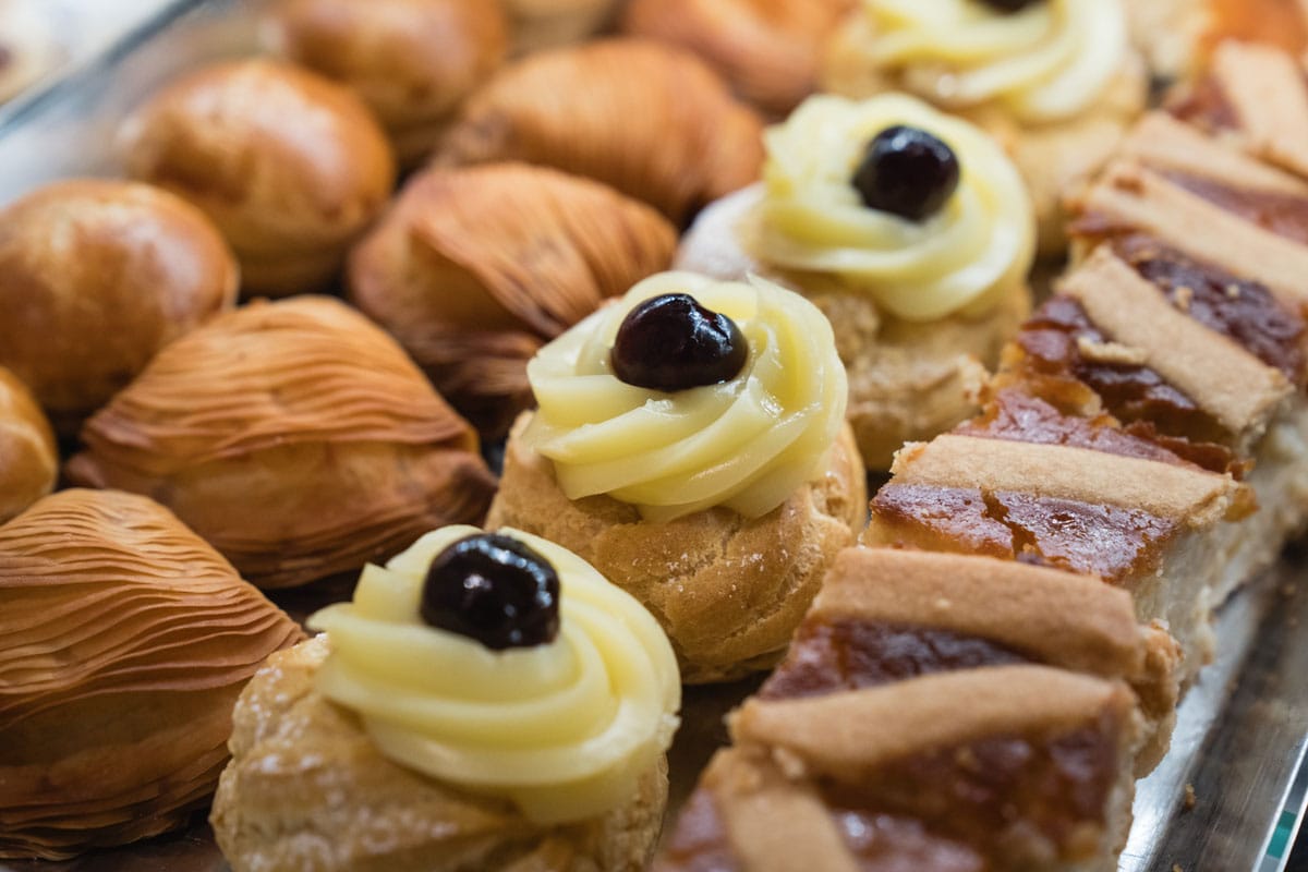 Indulge in the sweet side of Naples with a Naples must, sfogliatelle. 