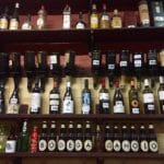 A Wall of Wine and Spirits at Bodega Manolo