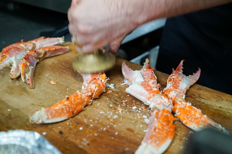 Crushing the crabs, photo by Katherine Whittaker