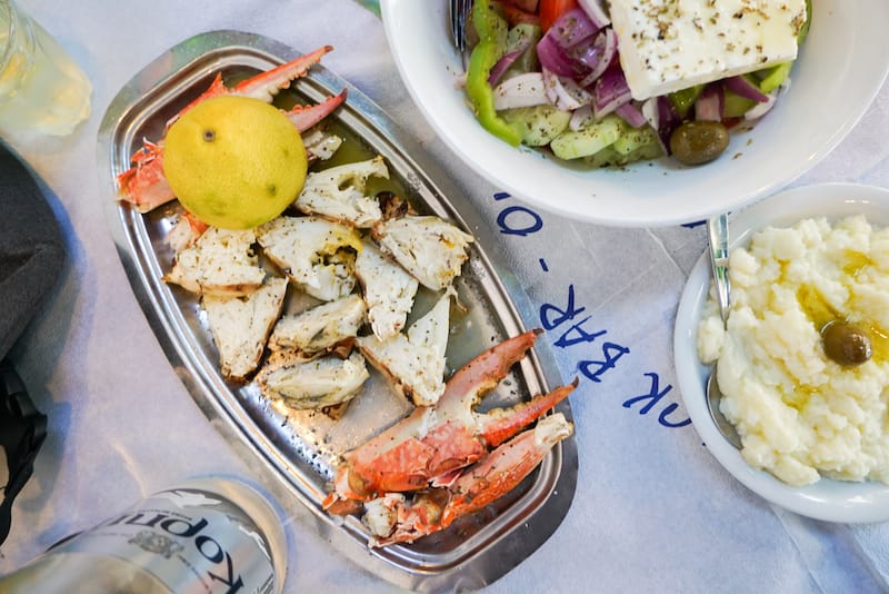 Crabs with salads and sides, photo by Katherine Whittaker