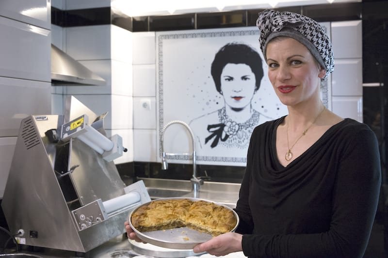 Ioanna Amoutzaki, the owner of Cocona, holds one of her pies, photo by Anastasia Adamaki