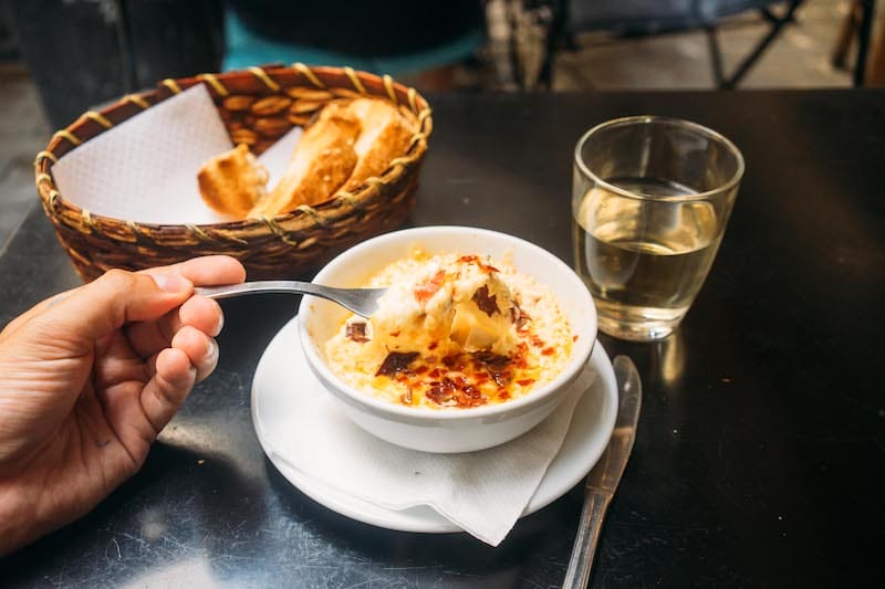 To Egyptiako, a mix of pastourma, tomato, egg, feta and melted cheese, at Kapnikarea, photo by Marco Arguello