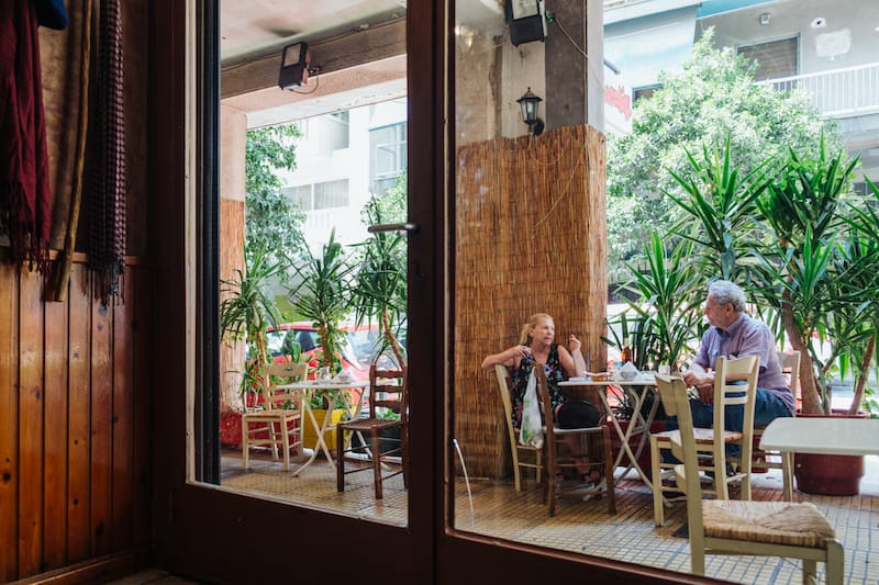 Most of the outdoor table at Koutoukaki are already taken by older locals during the day, photo by Manteau Stam