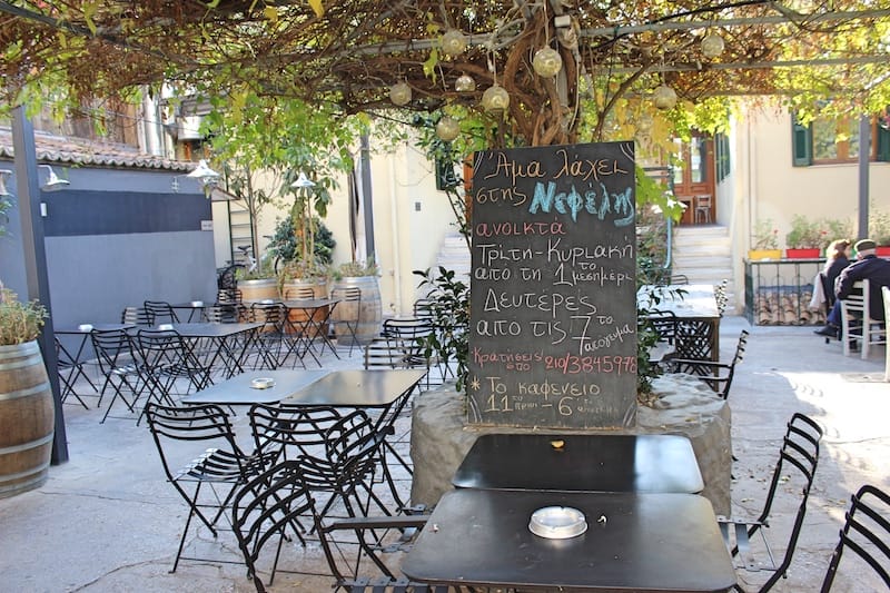 The stone-paved courtyard at Ama Lachi stis Nefelis, photo by Carolina Doriti
