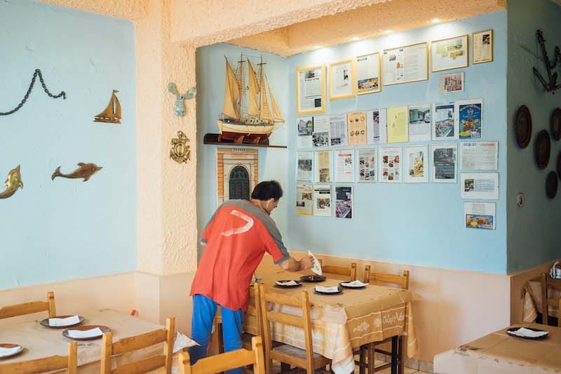 The charming, sea-themed interior of Ouzeri Tou Laki, photo by Marco Arguello