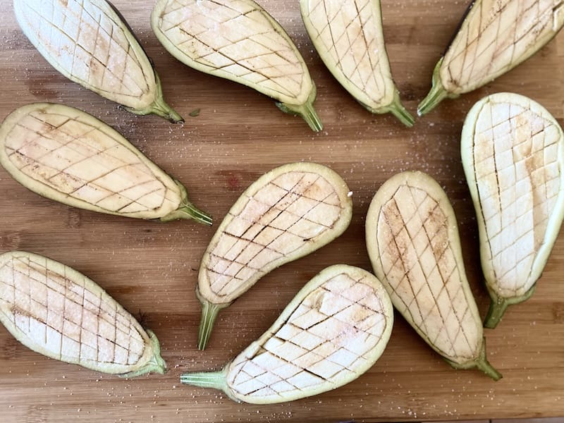 Cut diagonal lines in one direction and then the other to create a diamond pattern in the eggplant, photo by Carolina Doriti