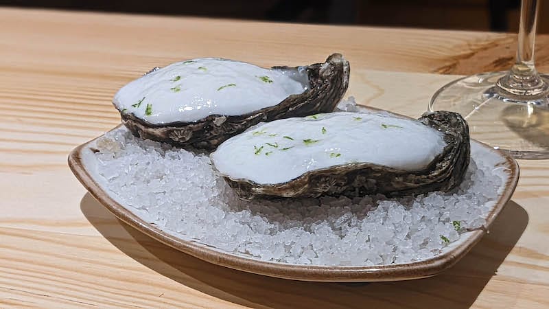 Oysters with cachaça sour foam, photo by Lior Shechori