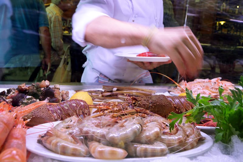 Selecting seafood at Carballeira, photo by Paula Mourenza