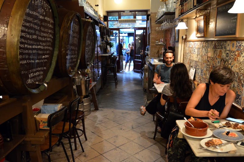Much of La Moderna's interior, including its wine barrels, have been left intact, photo by Paula Mourenza historic bodega eixample