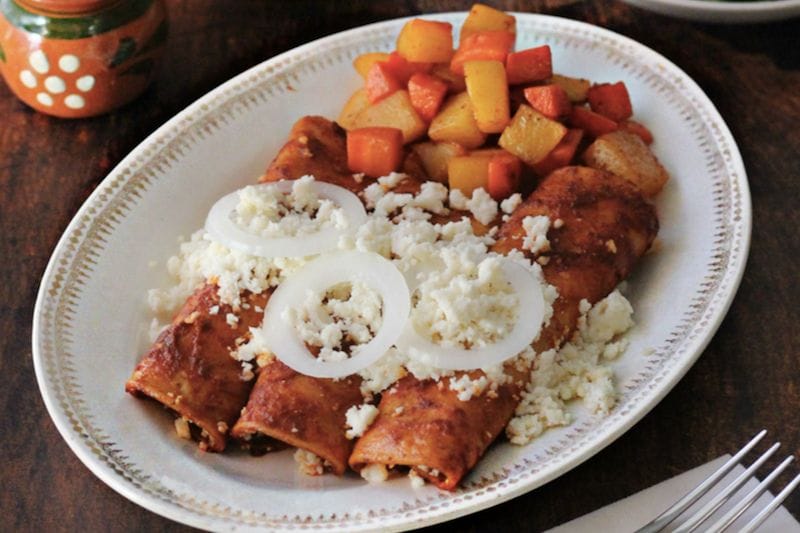 Enchiladas rojas from “The Mexican Home Kitchen,” photo by Mely Martínez