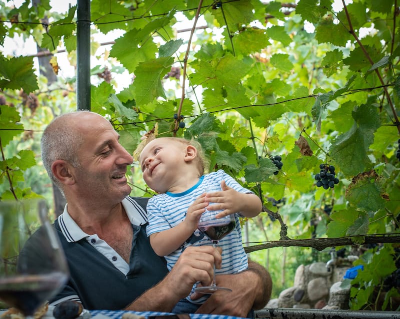 Gia Chubinidze and his 10-month-old Beka, photo by Justyna Mielnikiewicz