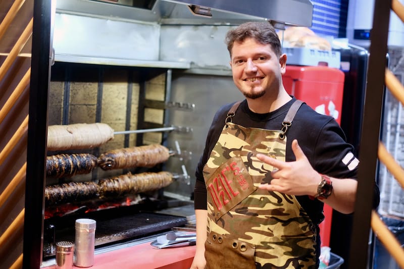 Oğuzhan Sayı mans the kokoreç at his shop, Ozzie’s Kokoreç, photo by Paul Benjamin Osterlund