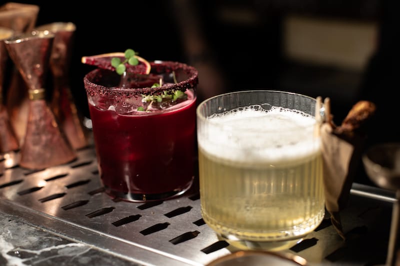 The beet-based Leb-Ü Derya (L), and the ayran and simit inspired Martı (R) cocktails at Fahri Konsolos, photo by Bradley Secker