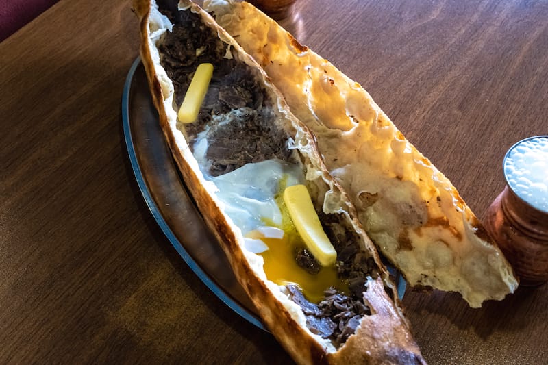 An open kapalı pide, photo by Gökhan Çelem
