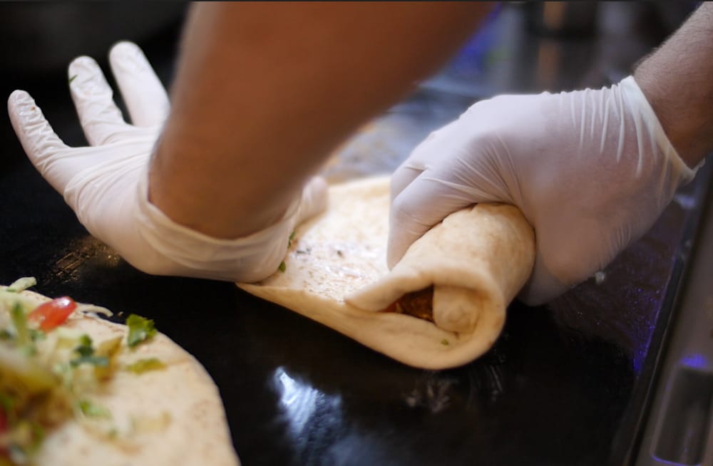 Making falafel, a still from “Meet Me in Yusufpaşa,” a film by Tara Milutis