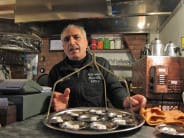 Mustafa Amca serves tea from Rize on the Black Sea coast in Hacopulo Pasajı. Photo by Ansel Mullins.