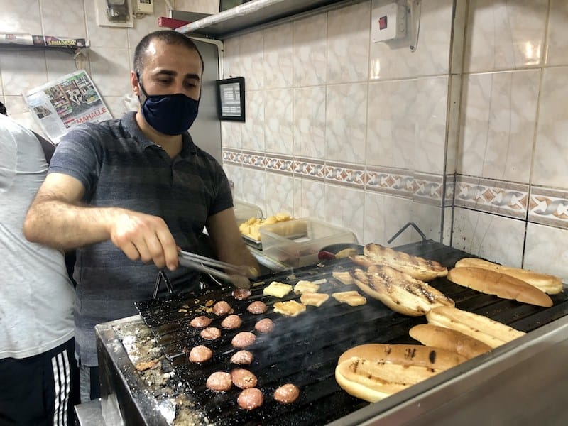Isa behind the grill at Kumrucu Apo in Izmir, photo by Paul Benjamin Osterlund