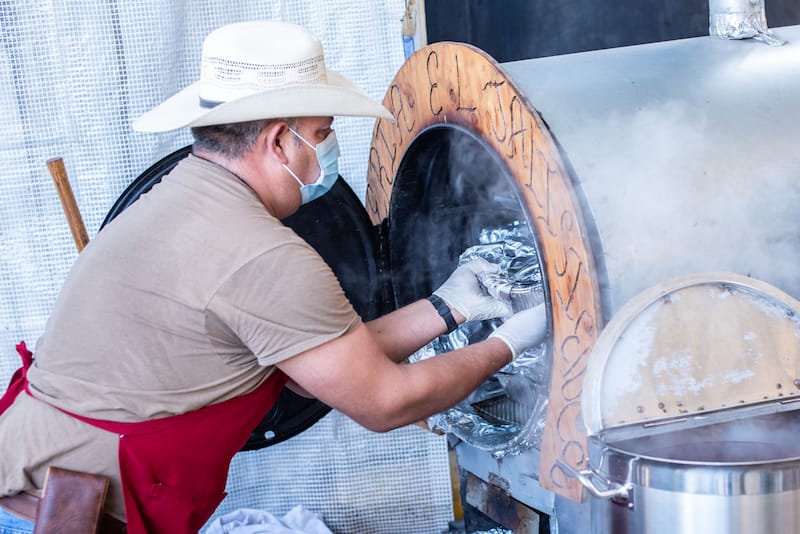 The oval wooden frame of Hector’s oven is scrawled with his business’s name: “El Jaliciense,” the idiomatic term for someone born to the central western state of Jalisco, Mexico, photo by Vitaly Belousov