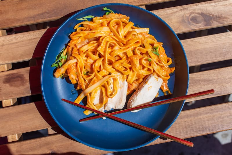 The kimchi tagliatelle’s creamy, cheese-slicked ribbons are cut by the delicate acidity of the rendered pickled cabbage and preserved lemon, photo by Vitaly Belousov