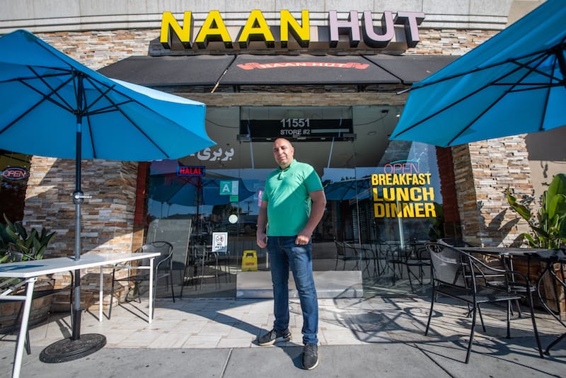 Ali Mohammedi (pictured) oversees Naan Hut for its Iran-dwelling owner, Abolfazl Sadeghizadeh, photo by Vitaly Belousov