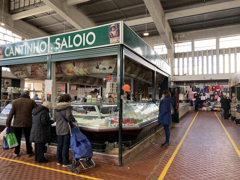 A cheese and charcuterie stand at Mercado de Alvalade, photo by Célia Pedroso