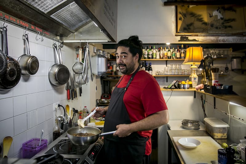 Francisco (Chico) Jesus, who is half-Macanese, is at work in the kitchen at Patuá, photo by Rodrigo Cabrita