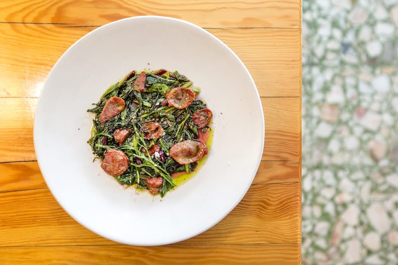 Seasonal greens with chouriço at Pigmeu, photo by Rodrigo Cabrita