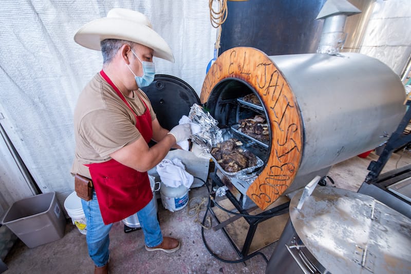 Hector Ramirez preparing his goat birria tatemada at El Jaliscience in Boyle Heights, photo by Vitaly Belousov