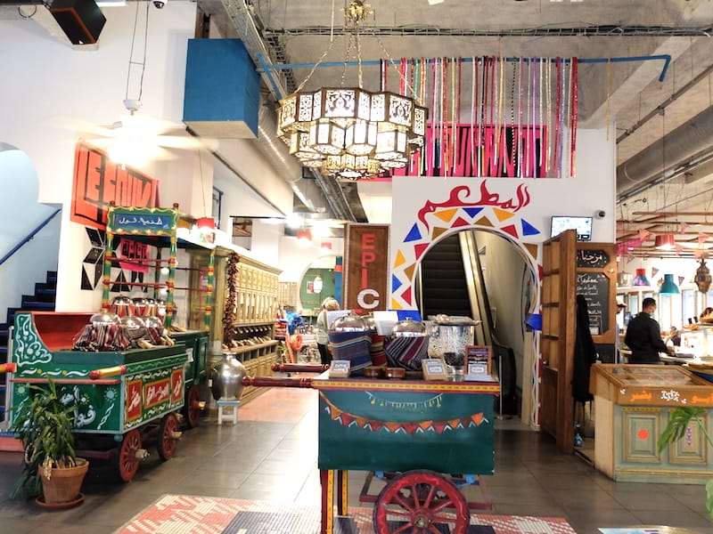 In the front half of Souk de Nour d’Egypte, wooden carts brim with spices, ice cream and other foodstuffs, photo by Alexis Steinman
