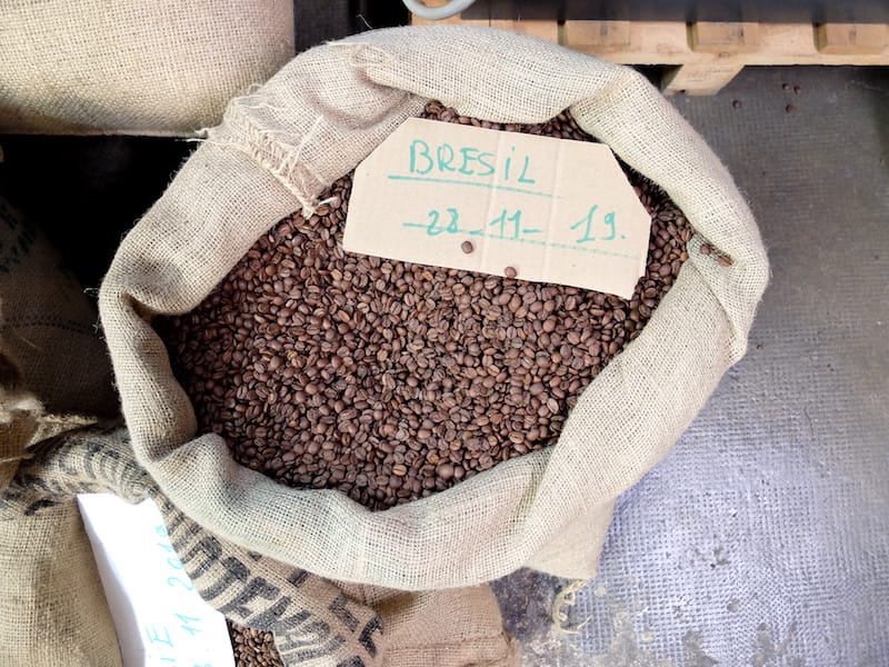 Café Luciani’s small warehouse is littered with burlap sacks full of coffee beans, photo by Alexis Steinman