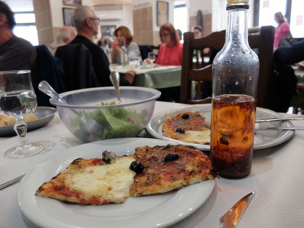 A half-and-half (moitié-moitié) pizza at Chez Etienne, photo by Alexis Steinman