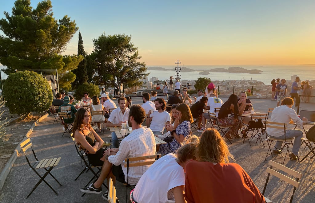 Customers enjoy the food and the view at the food truck Le Bon Air, photo by Annie Etheridge