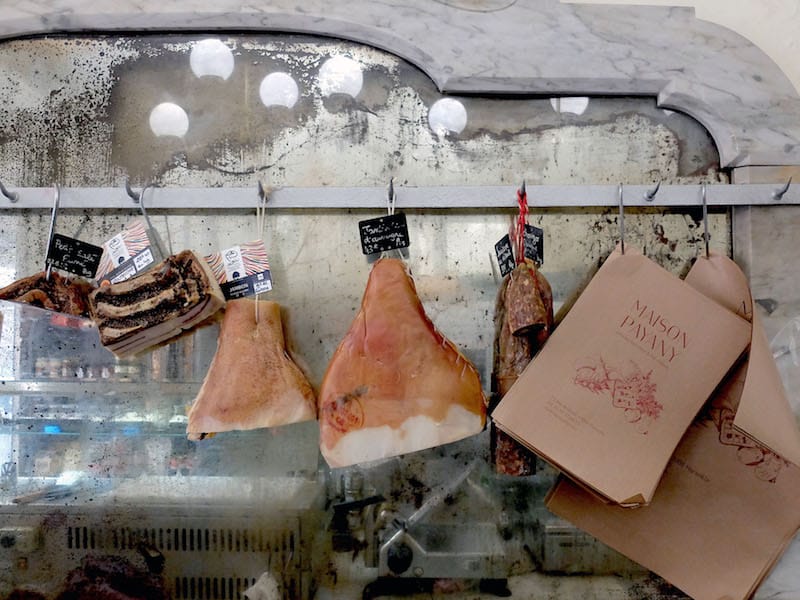 Cuts of meat hang in front of the smoky mirror at Maison Payany in Marseille, photo by Alexis SteinmanCuts of meat hang in front of the smoky mirror at Maison Payany in Marseille, photo by Alexis Steinman