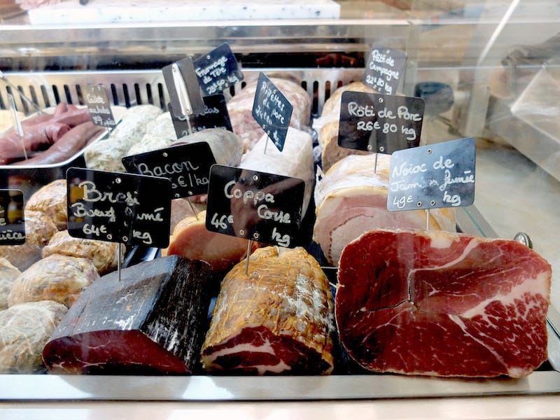 A glass case full of cured meats at Maison Payany in Marseille, photo by Alexis Steinman
