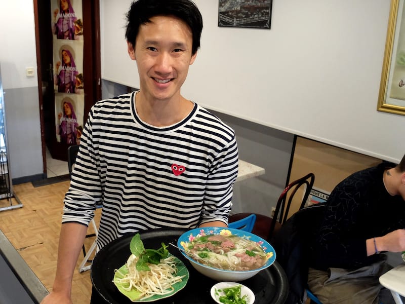 Jean Hoang – who has inherited his mother's wide smile – works at the restaurant full time, photo by Alexis Steinman