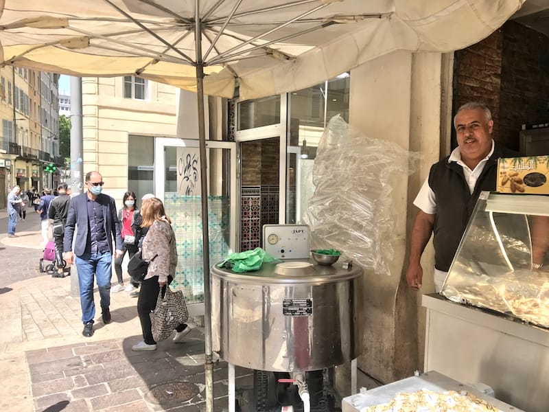 the giant, stainless steel urn of lait fermenté set up at the snack bar besides Pâtisserie Orientale Tanite, photo by Alexis Steinman