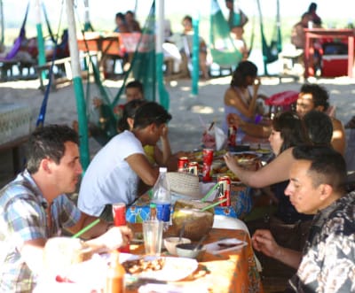 Eating in Laguna de Coyuca, Acapulco, photo by Ben Herrera
