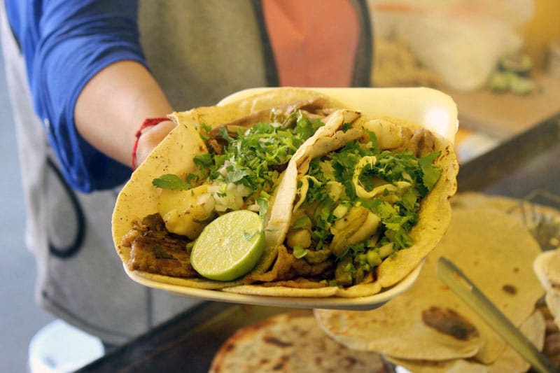 The tacos de bistec (skirt steak tacos) at Antojitos Mexicanos Raquel, photo by James Young