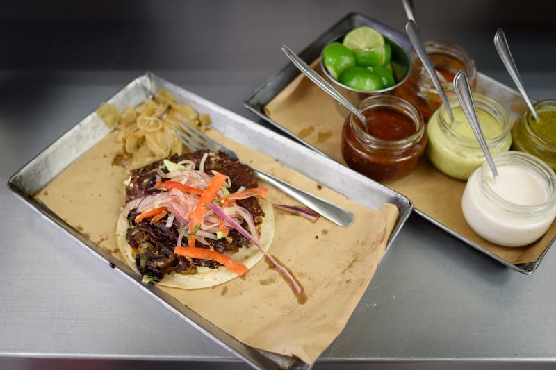 Chicharon con queso with a wheat tortilla at Taquería Orinoco, photo by PJ Rountree