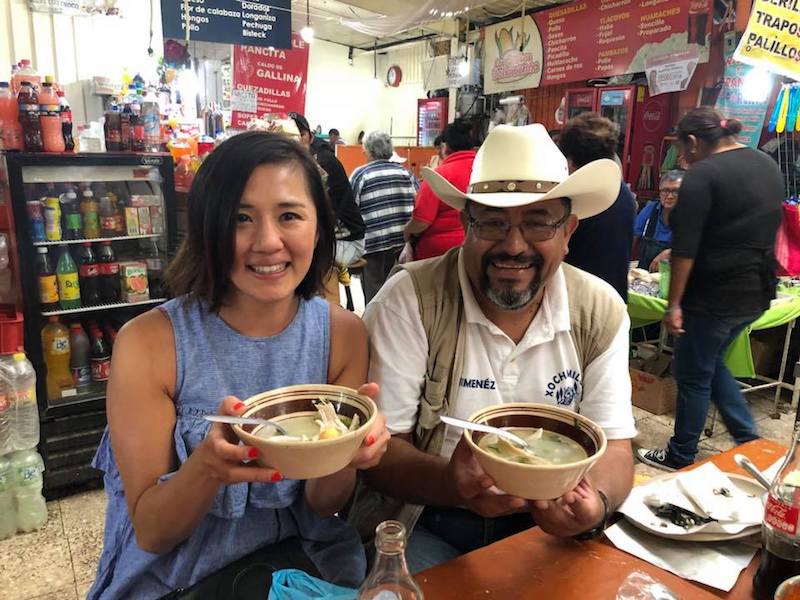 Paco de Santiago (r) and a friend (l) enjoy the chicken soup at Caldos de Gallina Don Beto, photo by Paco de Santiago