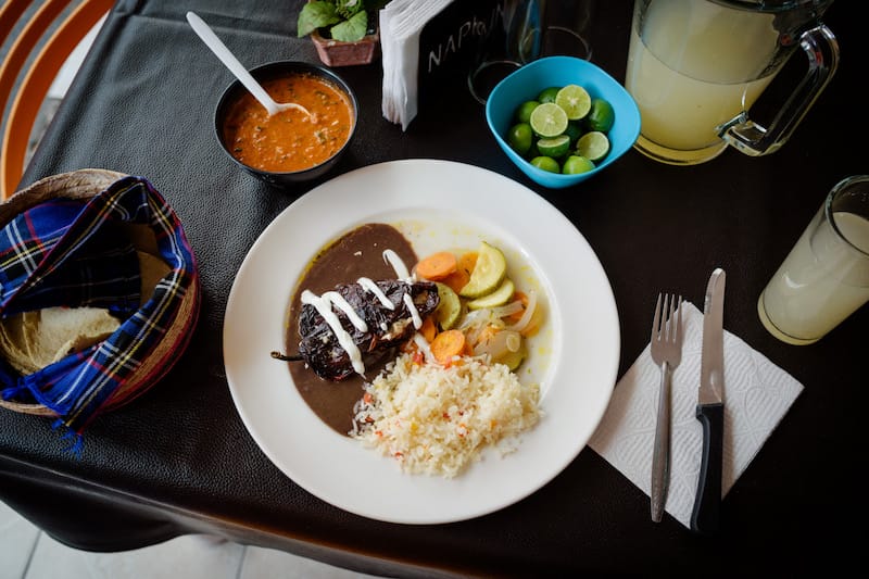 A chile ancho relleno with oyster mushrooms and cheese at La Divina Culpa, photo by PJ Rountree