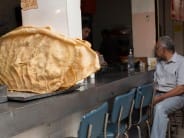 Giant chicharrones. The vendors show off their skill by frying the entire skin of the hog.