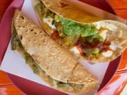 Quesadillas with fresh cheese and squash blossoms. I got these just outside the Coyoacán market.