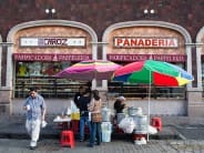 A family-run tamale stand selling Oaxacan tamales. They set up around 7 a.m. and are finished by 9 a.m. or so. I am fond of tamales verdes but they also do a killer mole tamale.